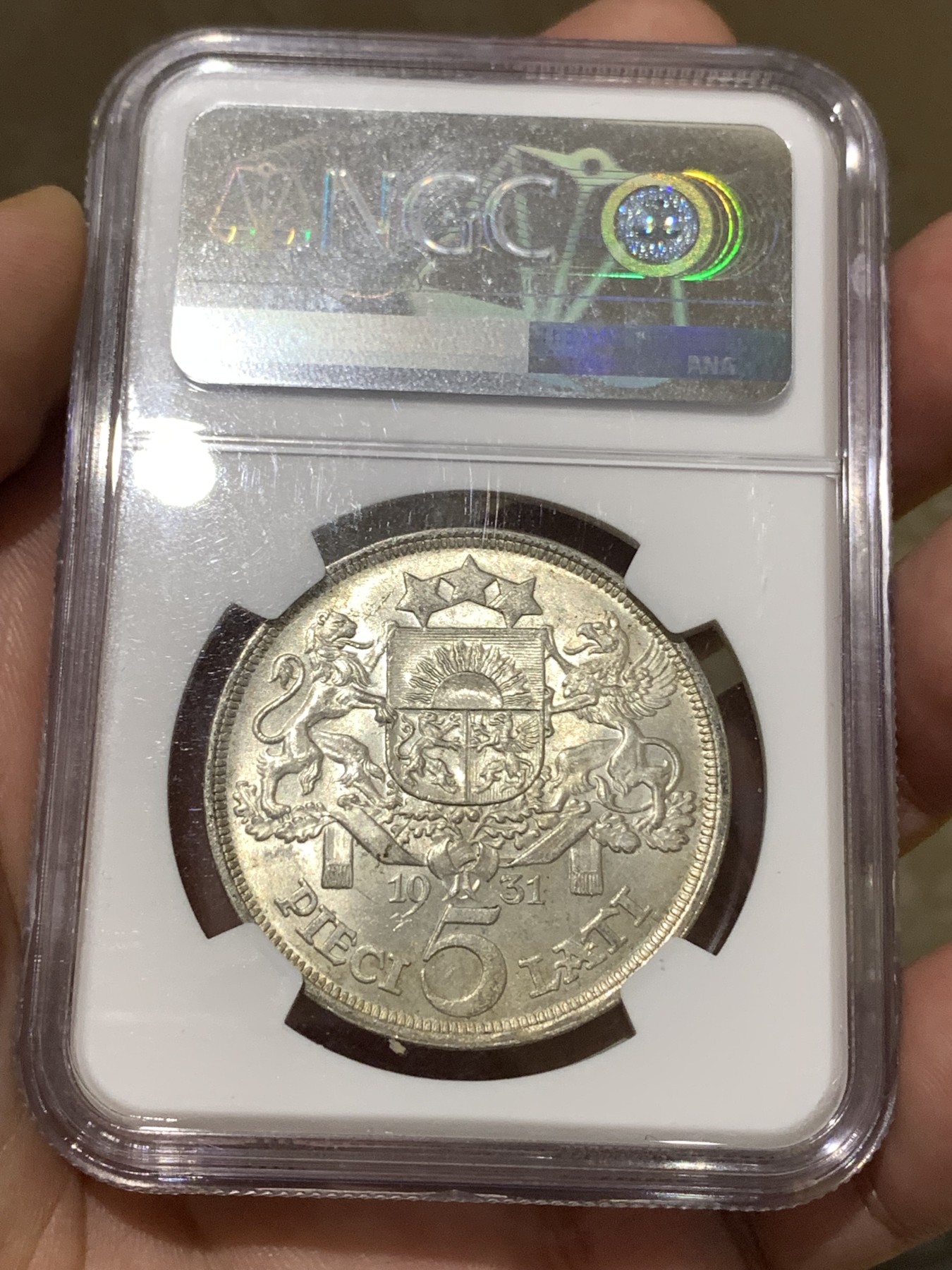 《竞宝斋》第180场-周日，周一2场 (全场包邮) NGC-MS63 1931拉脱维亚5拉特银币，拉脱维亚上MS63不易，BU级转光，未清洗卷拆品相，微微淡黄色包浆