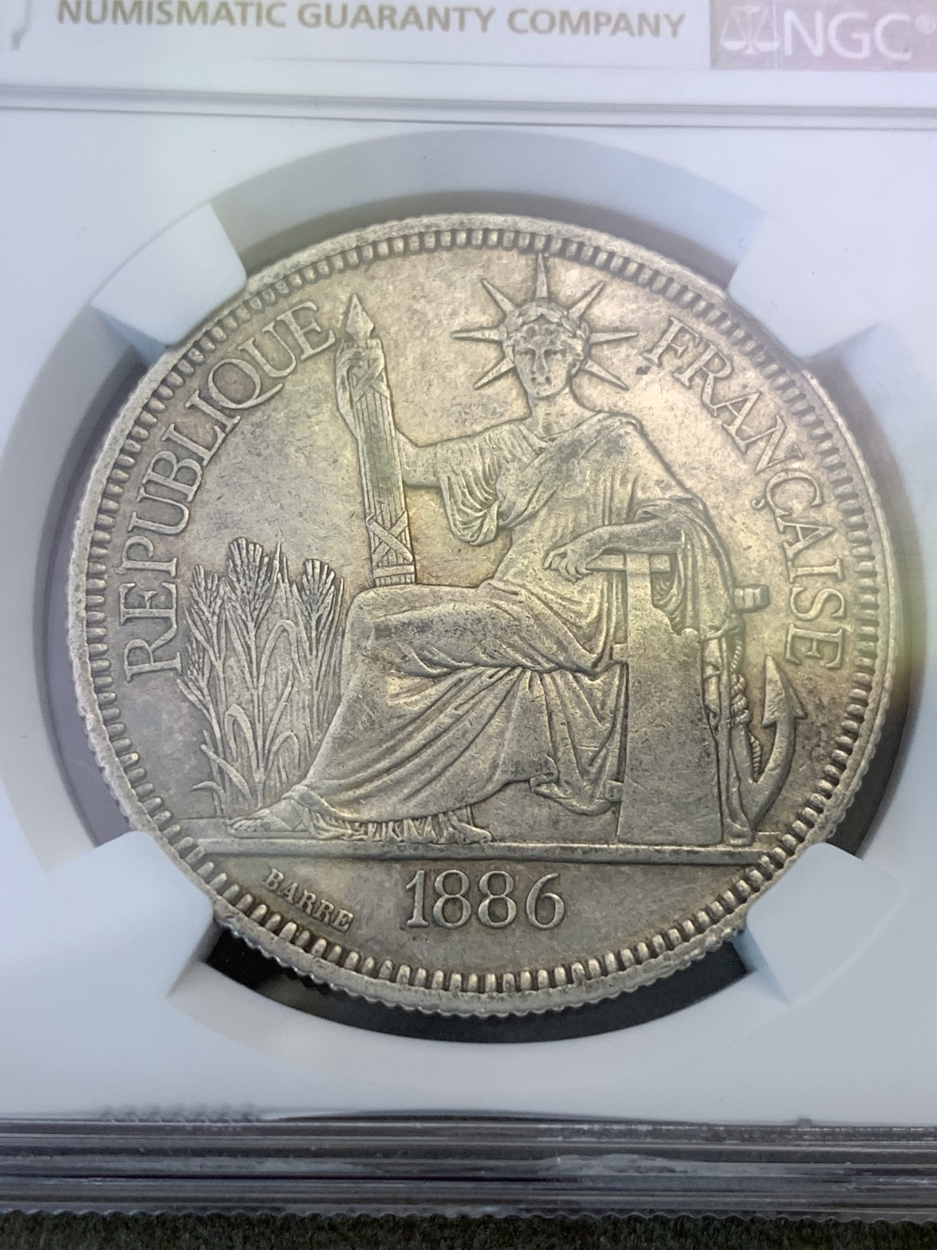 《竞宝斋》第180场-周日，周一2场 (全场包邮) NGC-AUD 法属坐洋 加重版 1886 1皮亚斯特银币 原味包浆