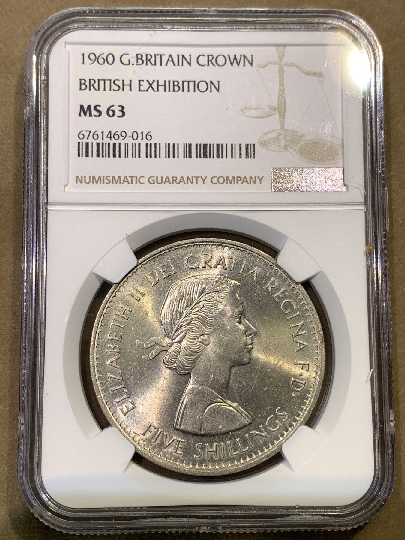 《竞宝斋》第180场-周日，周一2场 (全场包邮) NGC-MS63 英国1960伊丽莎白二世女王博览会纪念克朗，较少见品种，转光强烈，打制深峻，经典设计