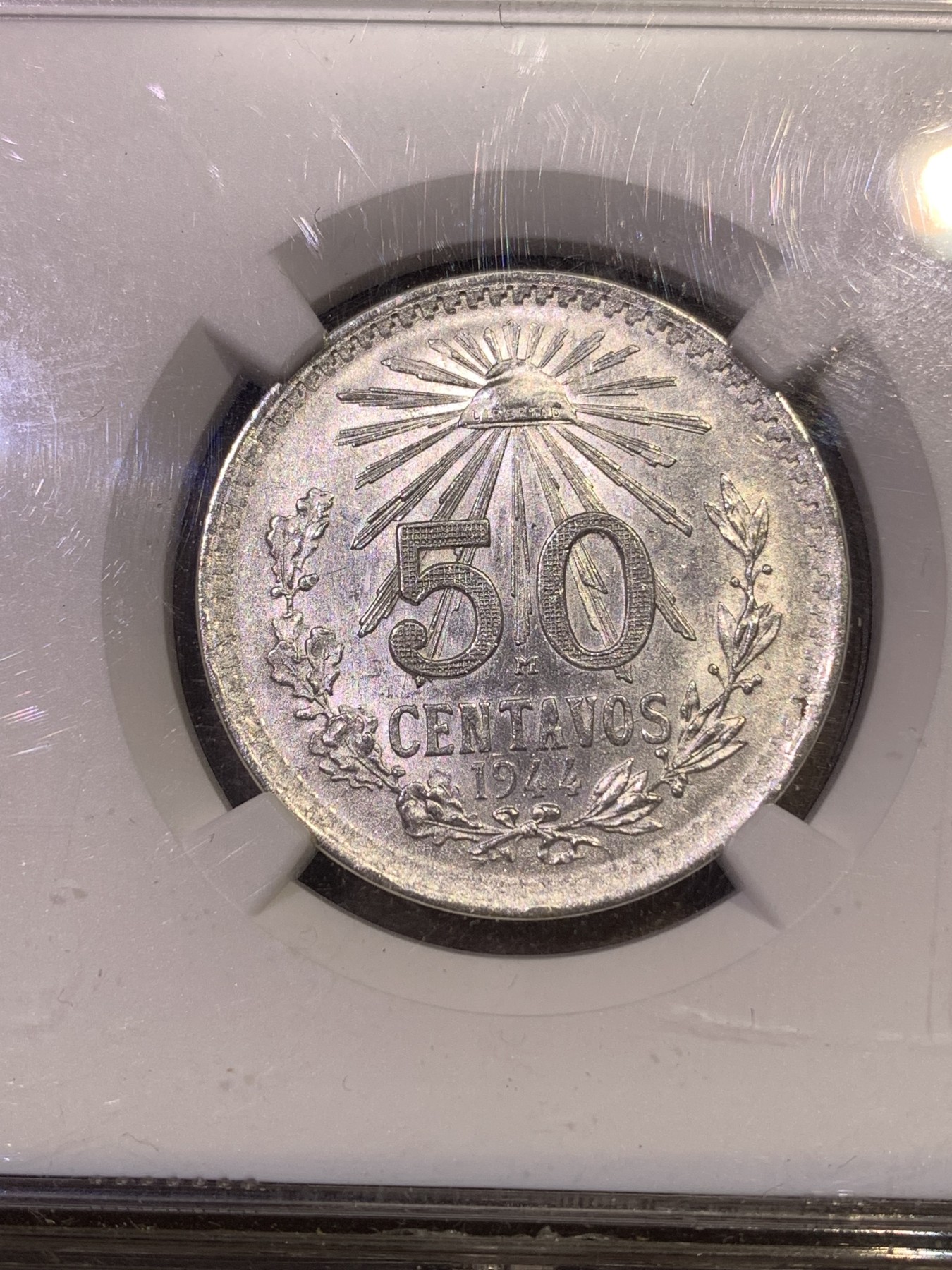 《竞宝斋》第180场-周日，周一2场 (全场包邮) NGC–MS63墨西哥 1944年50分鹰洋银币，盒子左下角磕边