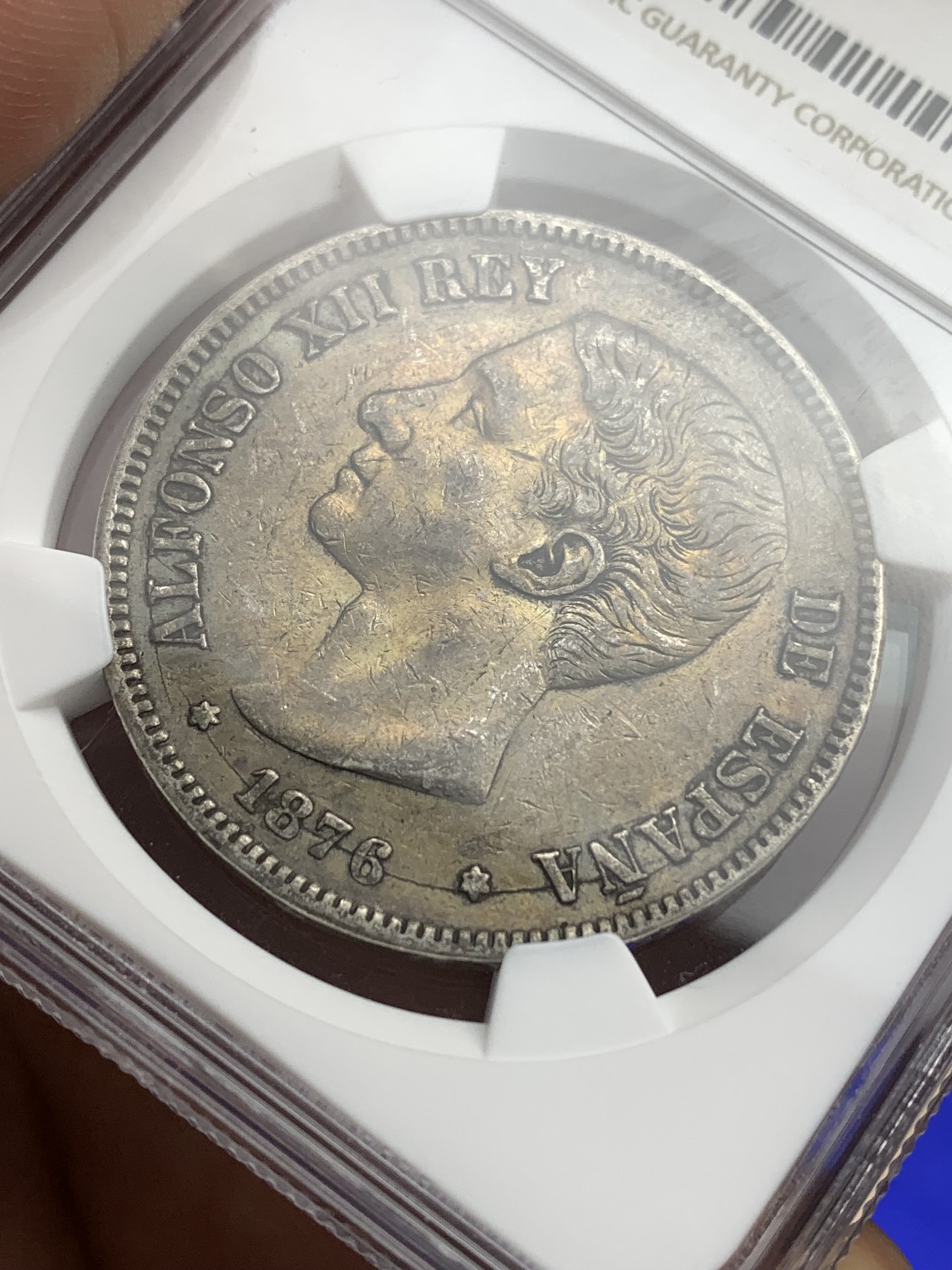 《竞宝斋》第180场-周日，周一2场 (全场包邮) NGC XFD 西班牙双柱阿方索十二世5P银币 双面深彩包浆 细节很不错