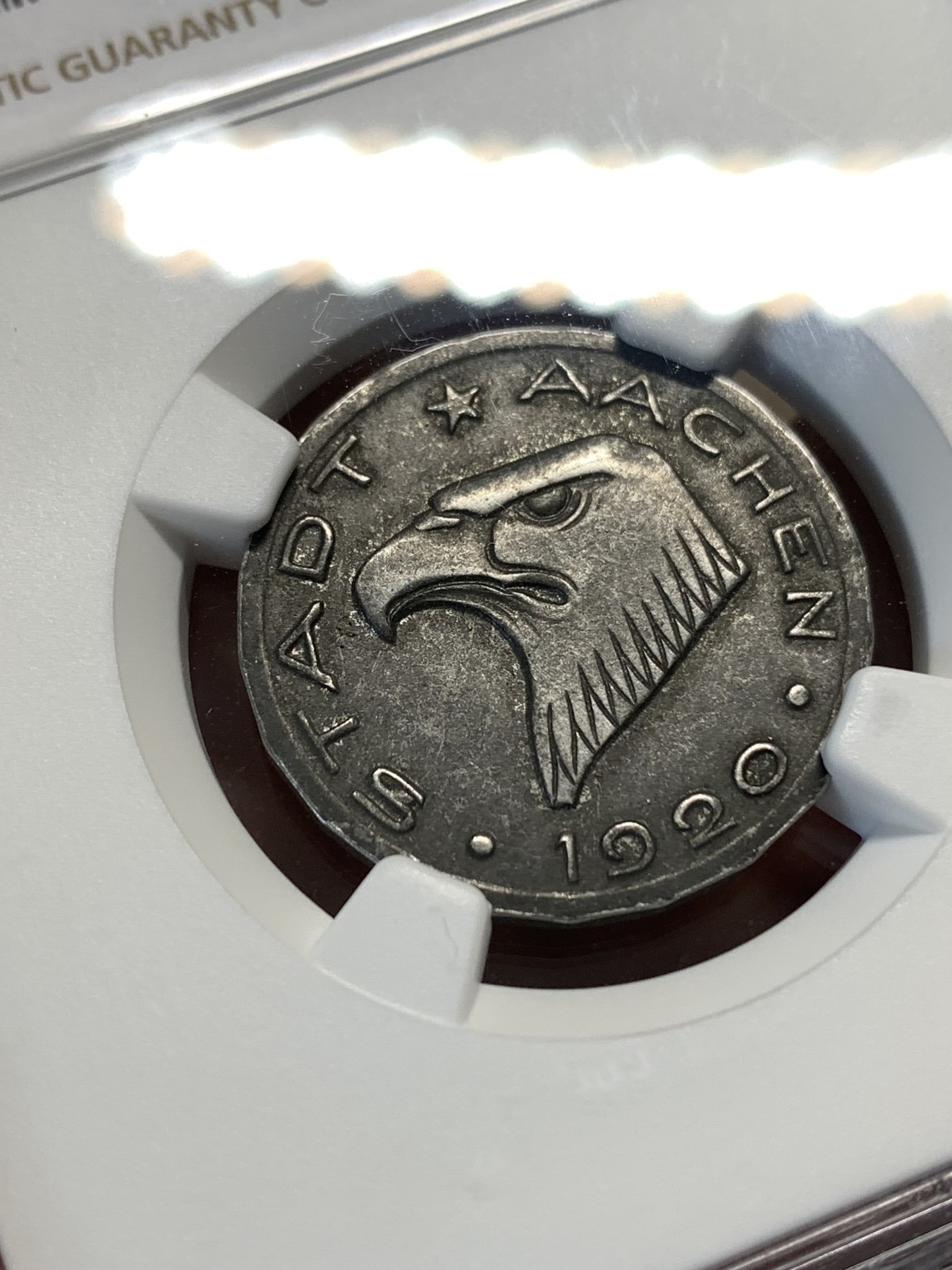 《竞宝斋》第180场-周日，周一2场 (全场包邮) NGC-MS62 德国紧急状态货币名誉品，1920年亚琛鹰头50芬尼铁币，好品难寻，银光闪闪，鹰头威风凛凛，惟妙惟肖