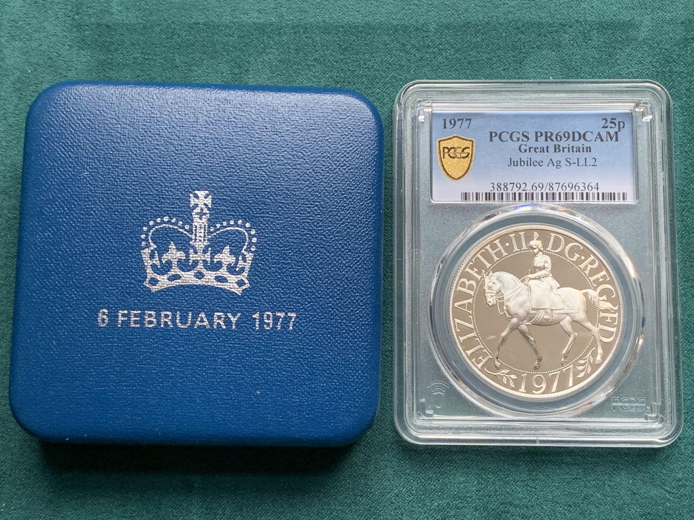 《竞宝斋》第180场-周日，周一2场 (全场包邮) PCGS-PR69DC 英国1977年伊丽莎白二世禧年精制25便士（克朗型）银币,69已经很难了，带原盒。