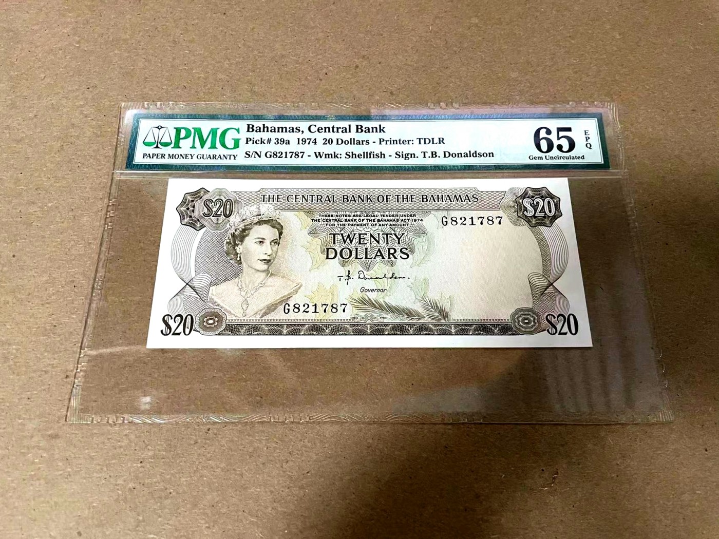 【Blue Auction】✨世界纸币精拍第344期——周日畅拍场【精】 【凑套必备 高值少见】巴哈马 经典彩背 1974年20元 女王 马车 PMG65EPQ 绝品