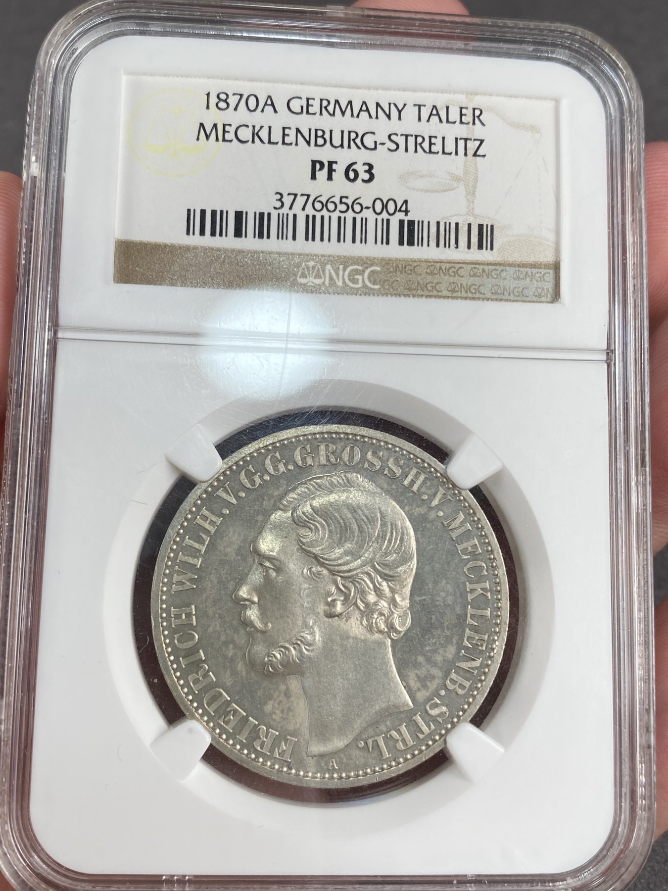 万国钱币拍卖第012期（视频直播专场） NGC PF63 1870年德国梅克伦堡精制1泰勒，加上普制的发行量只有5万枚，精制小邦难度可想而知，十年前ha拍卖原物，当年成交价就已经过800美金。