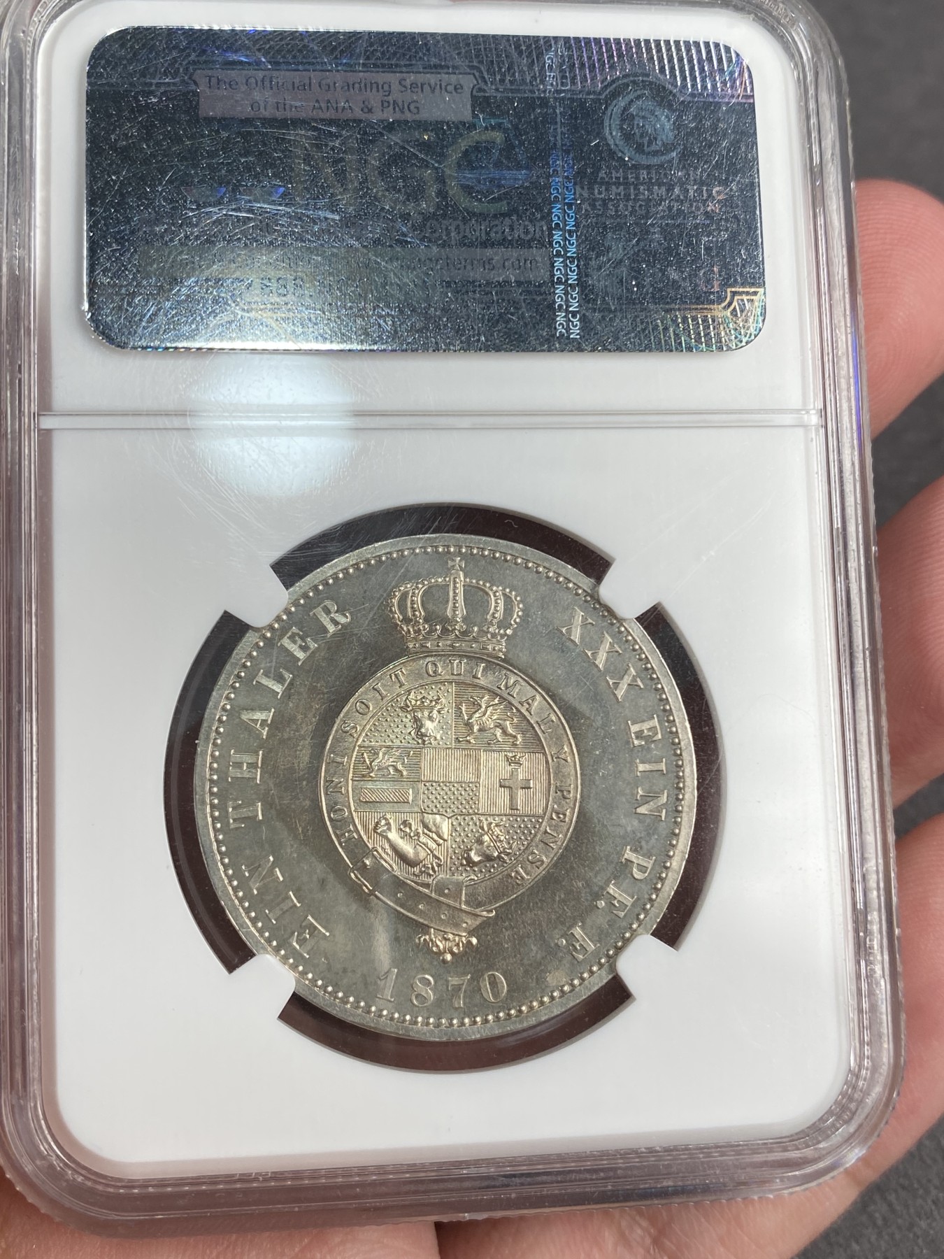 万国钱币拍卖第012期（视频直播专场） NGC PF63 1870年德国梅克伦堡精制1泰勒，加上普制的发行量只有5万枚，精制小邦难度可想而知，十年前ha拍卖原物，当年成交价就已经过800美金。