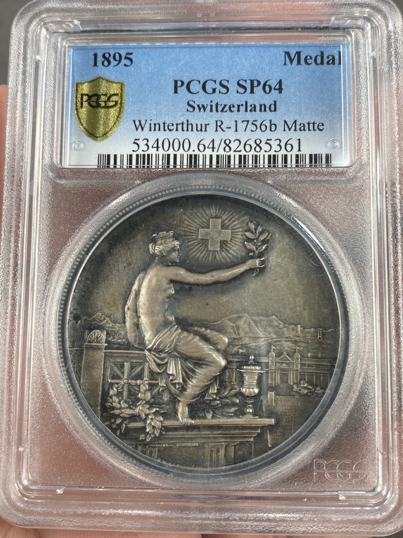 万国钱币拍卖第012期（视频直播专场） PCGS SP64 1887年瑞士苏黎世射击节女神景观大银章，磨砂精制，顶级品相，pc冠军分。