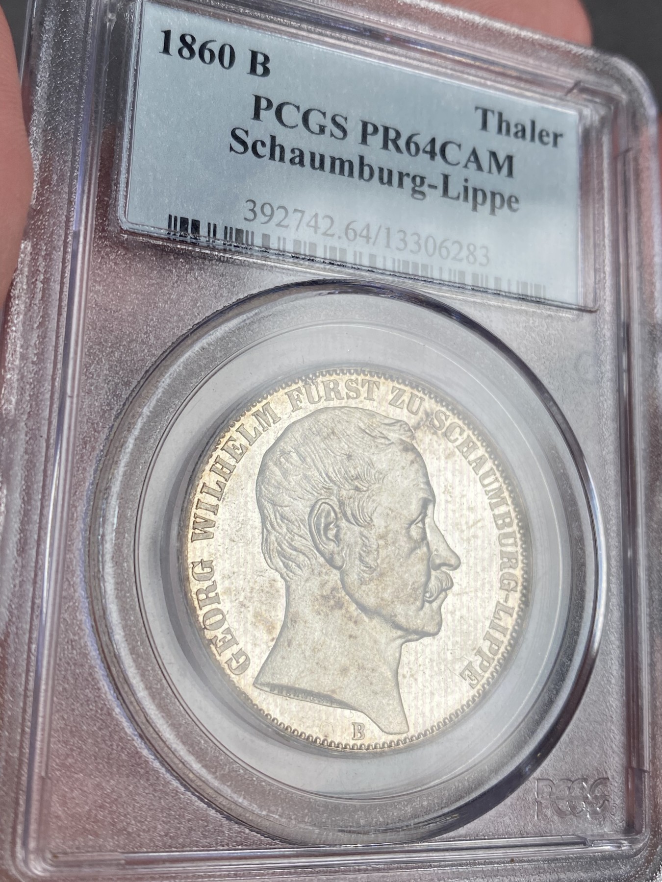 万国钱币拍卖第012期（视频直播专场） PCGS PR64CAM 1860德国绍姆堡利普精制天使泰勒，连同普制的发行量只有8000多枚，精制可以说是凤毛麟角，比1865天使泰勒精制少见很多，镜面凝霜感强烈，一眼区分，pc唯一冠军分，下面只有一枚62，难得老盒配置高清大图。