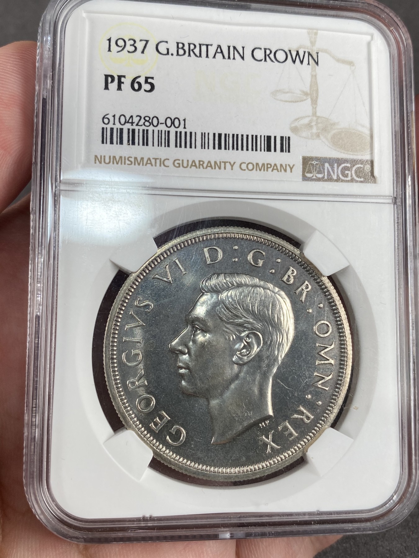 万国钱币拍卖第012期（视频直播专场） NGC PF65 英国1937年乔治六世登基纪念1克朗银币，高分精制镜面。