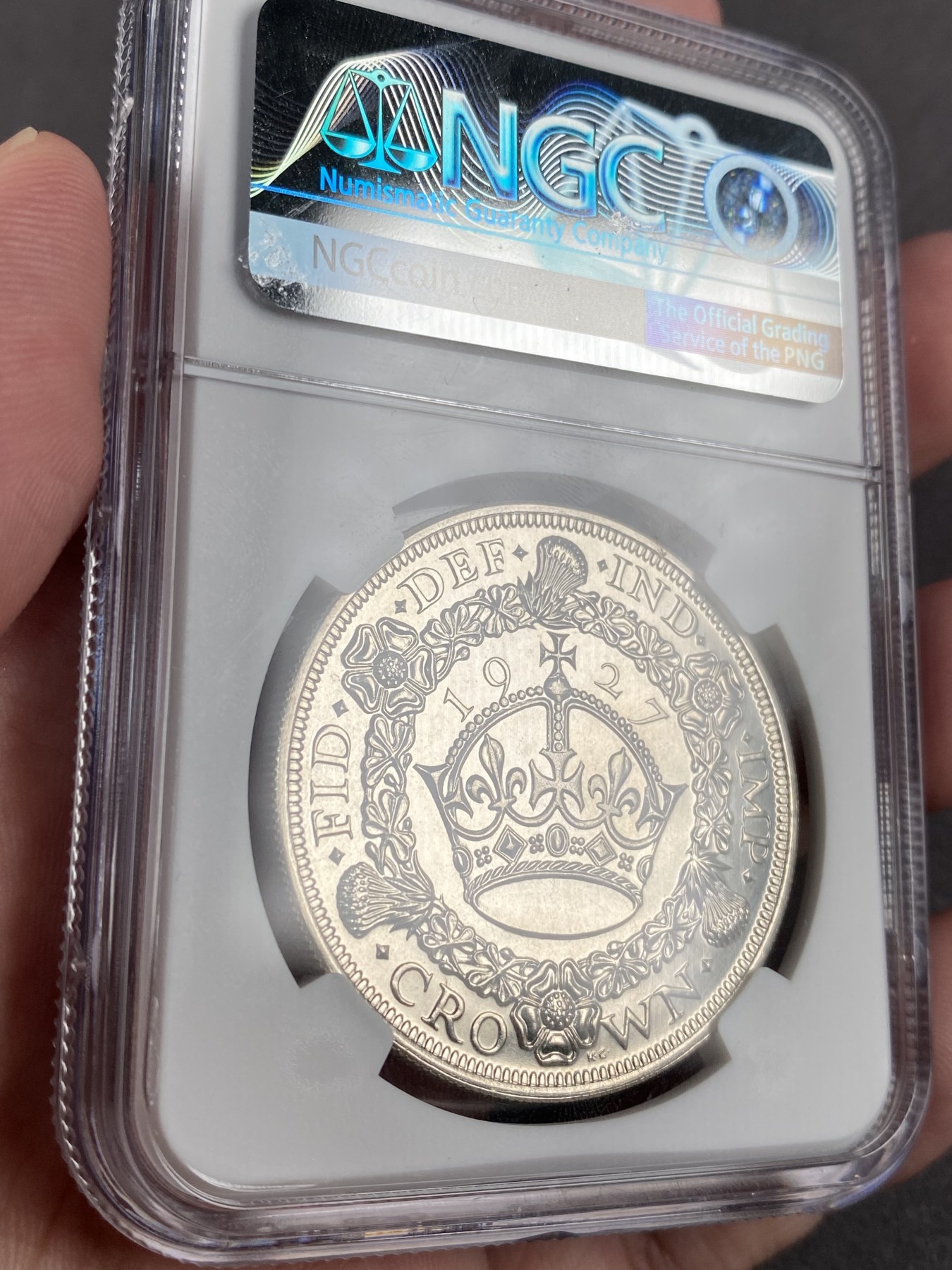 万国钱币拍卖第012期（视频直播专场） NGC PF64 英国1927年乔治五世精制花冠克朗，完美镜面品。