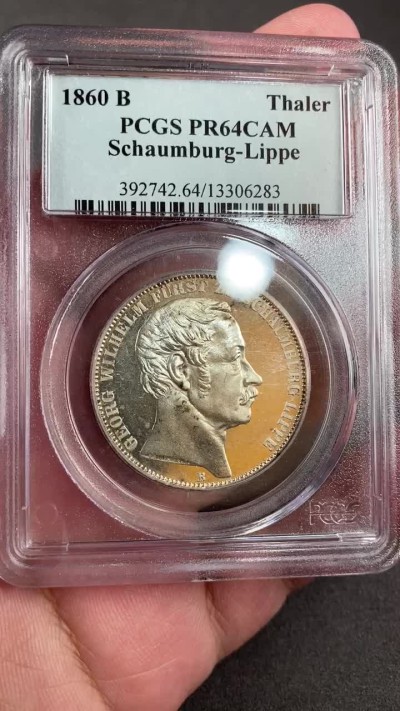 万国钱币拍卖第012期（视频直播专场） PCGS PR64CAM 1860德国绍姆堡利普精制天使泰勒，连同普制的发行量只有8000多枚，精制可以说是凤毛麟角，比1865天使泰勒精制少见很多，镜面凝霜感强烈，一眼区分，pc唯一冠军分，下面只有一枚62，难得老盒配置高清大图。