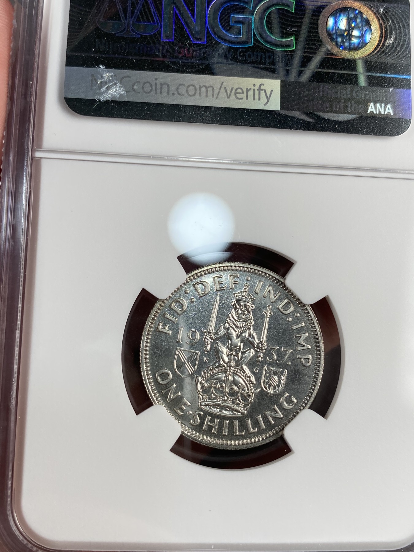 万国钱币拍卖第012期（视频直播专场） NGC PF66 英国1937年乔治六世登基纪念1先令，苏格兰坐狮版。