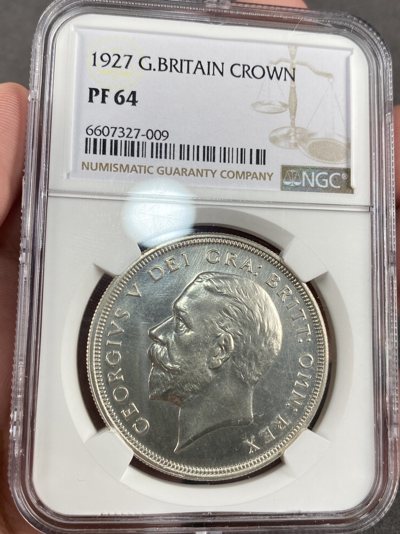 万国钱币拍卖第012期（视频直播专场） NGC PF64 英国1927年乔治五世精制花冠克朗，完美镜面品。