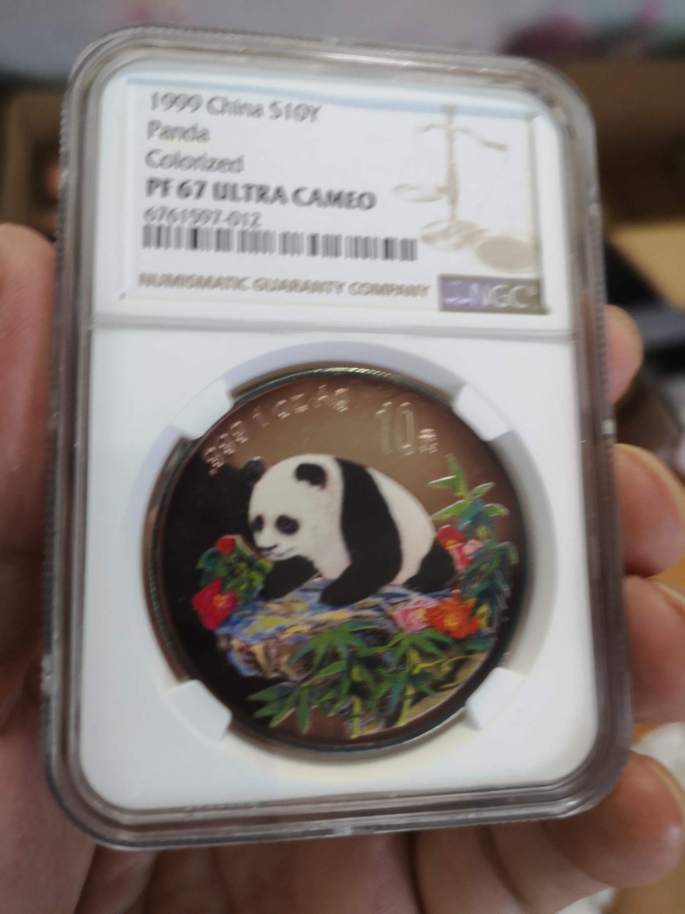 长老汇第17场儿童年评级币 1999中国大熊猫彩色10元精制银币，NGC PF67UC