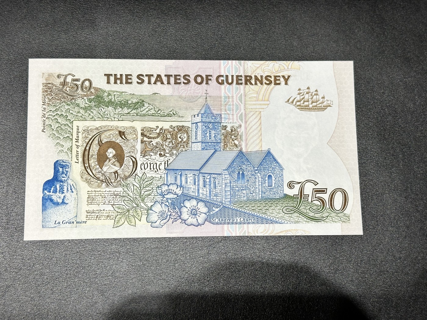 《外钞收藏家》第二百八十五期（连拍第二场）英国及英属专场 格恩西1996年50镑，A冠 全新 轻微潮点