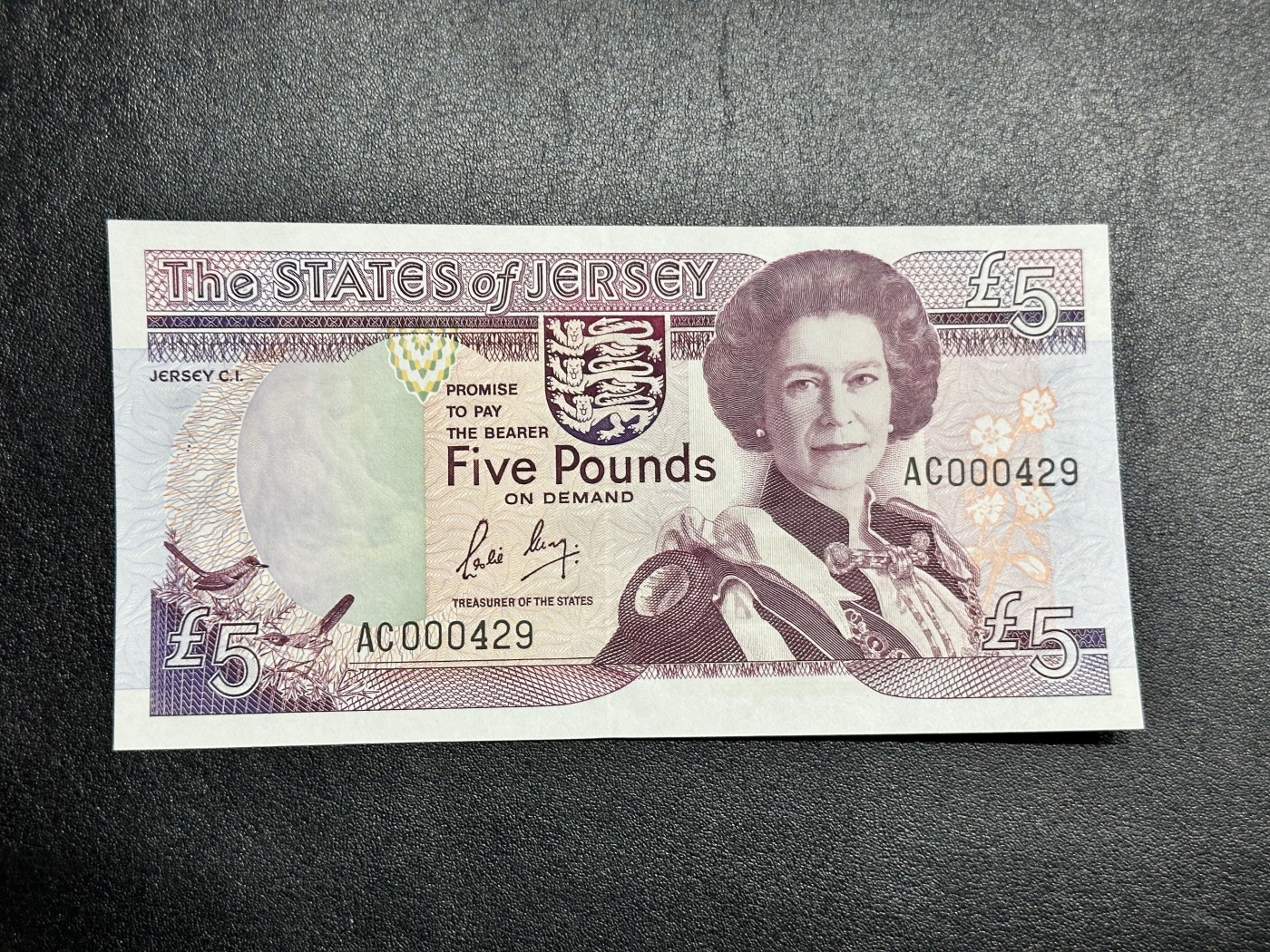 《外钞收藏家》第二百八十五期（连拍第二场）英国及英属专场 泽西岛1989年5镑，交流AC429号券 全新