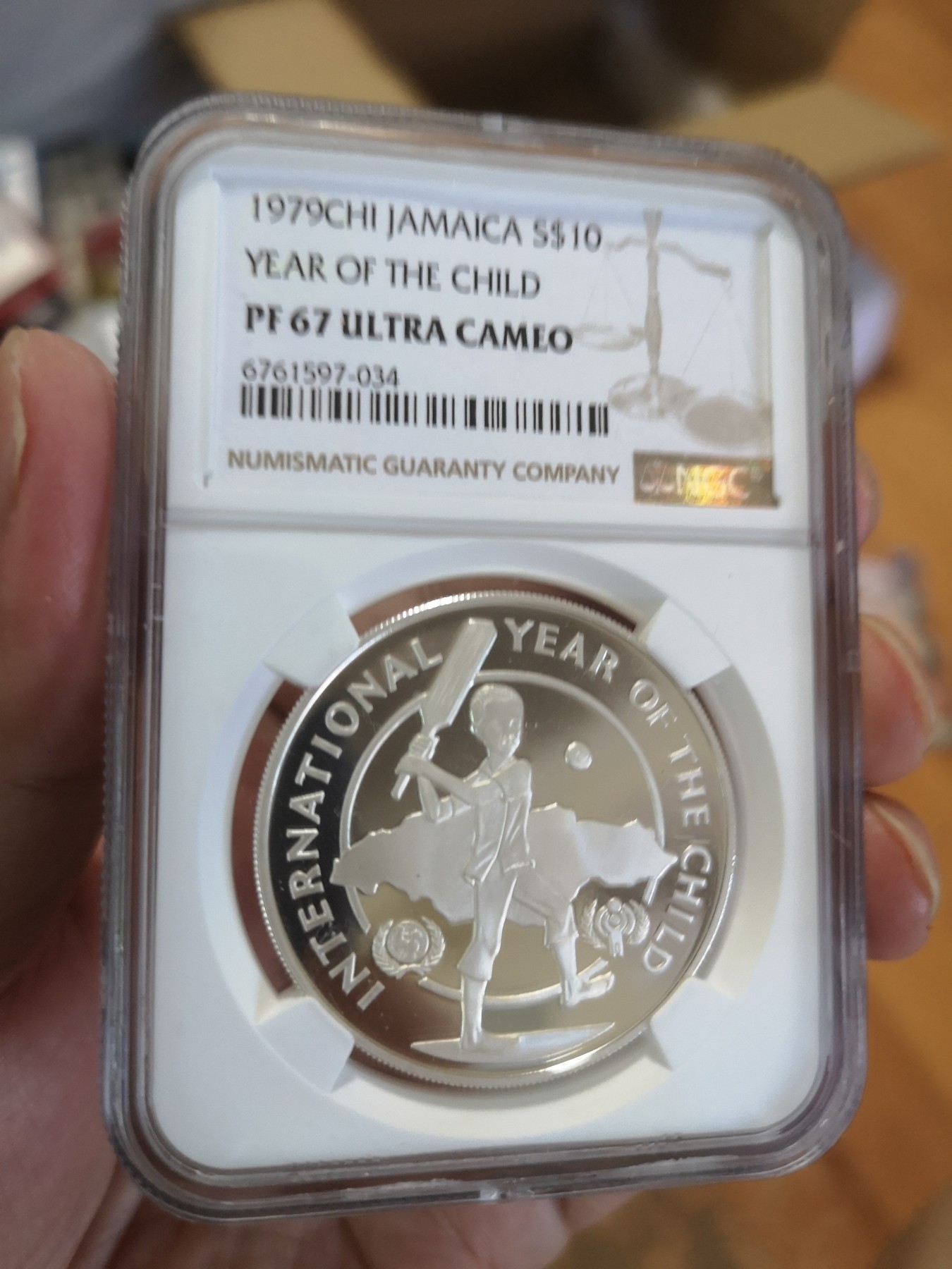 长老汇第17场儿童年评级币 1979牙买加儿童年10元精制银币，NGC PF67UC