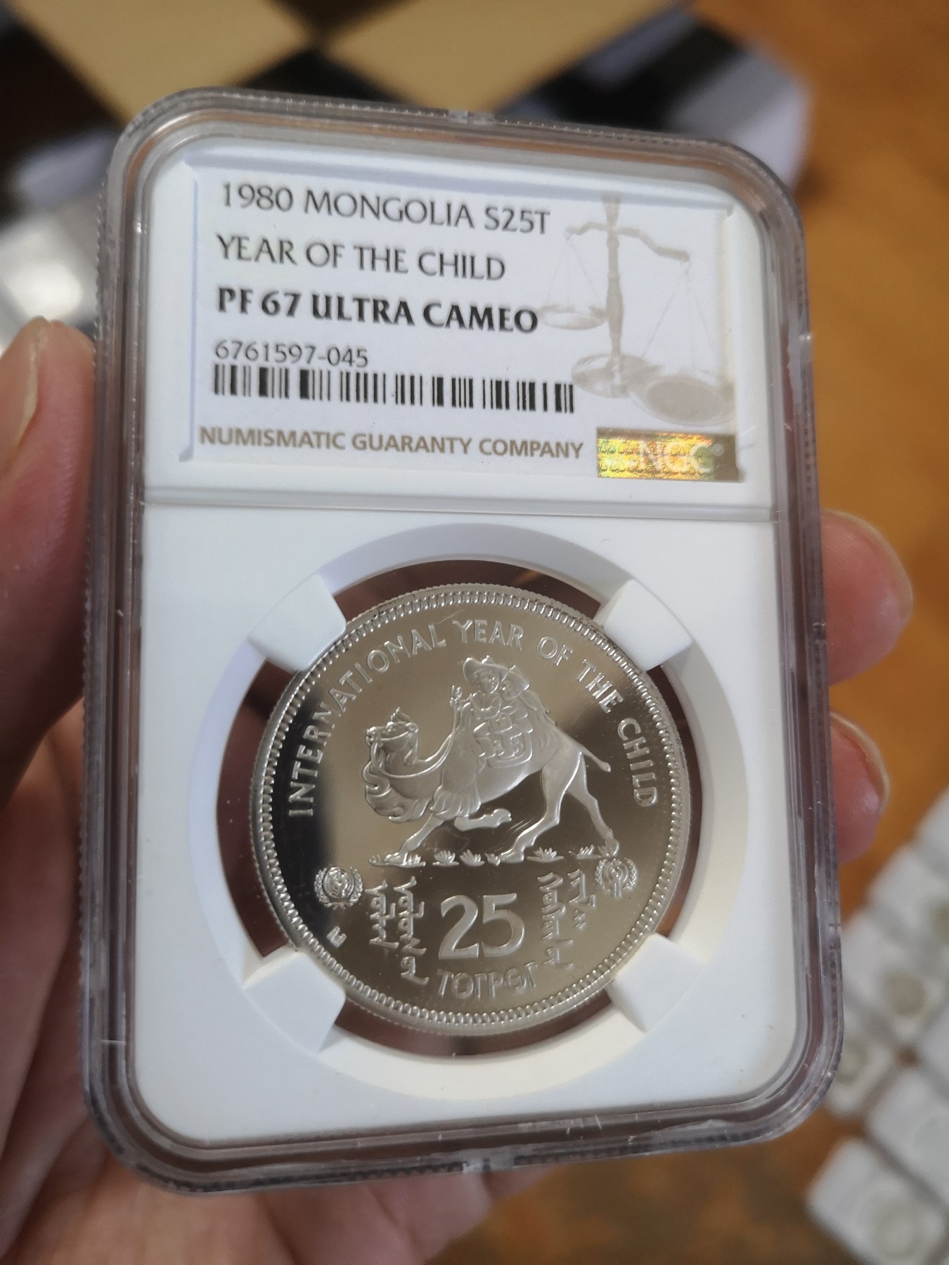 长老汇第17场儿童年评级币 1980蒙古儿童年25图格里克精制银币，NGC PF67UC