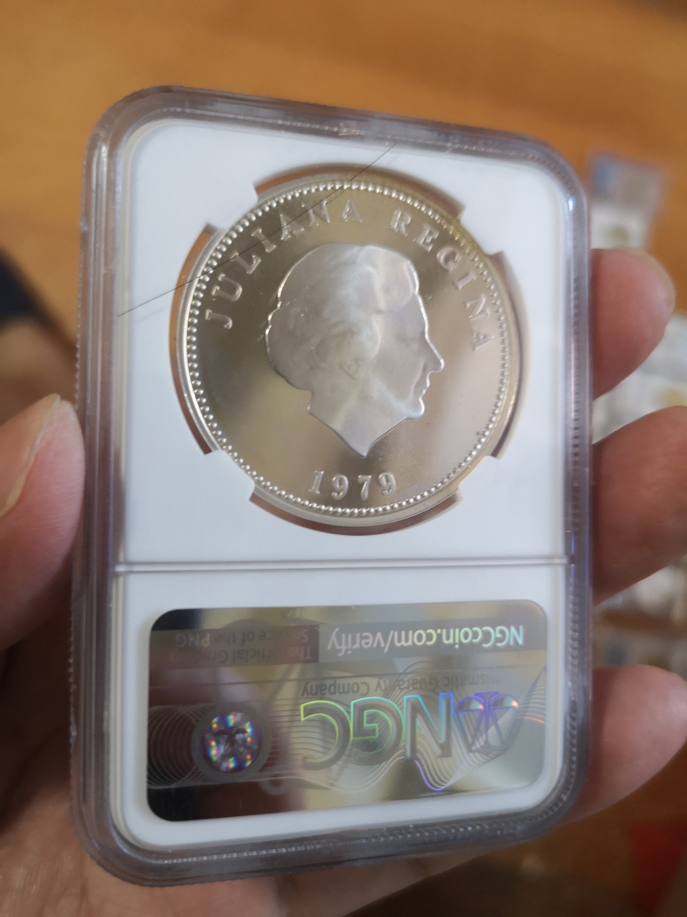 长老汇第17场儿童年评级币 1979荷属安第斯儿童年25盾精制银币，NGC PF66UC