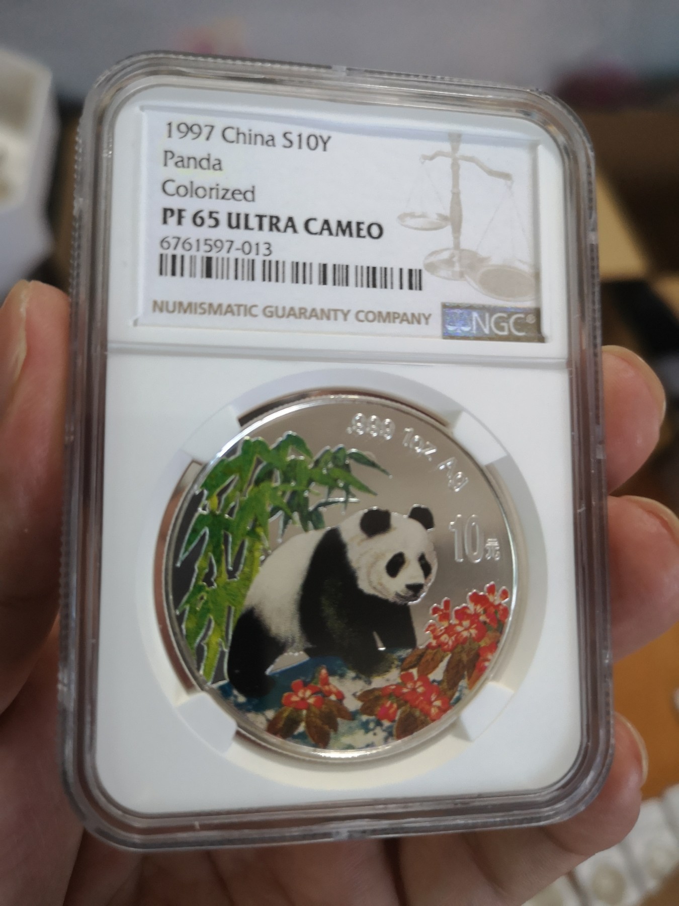 长老汇第17场儿童年评级币 1997中国大熊猫彩色10元精制银币，NGC PF65UC