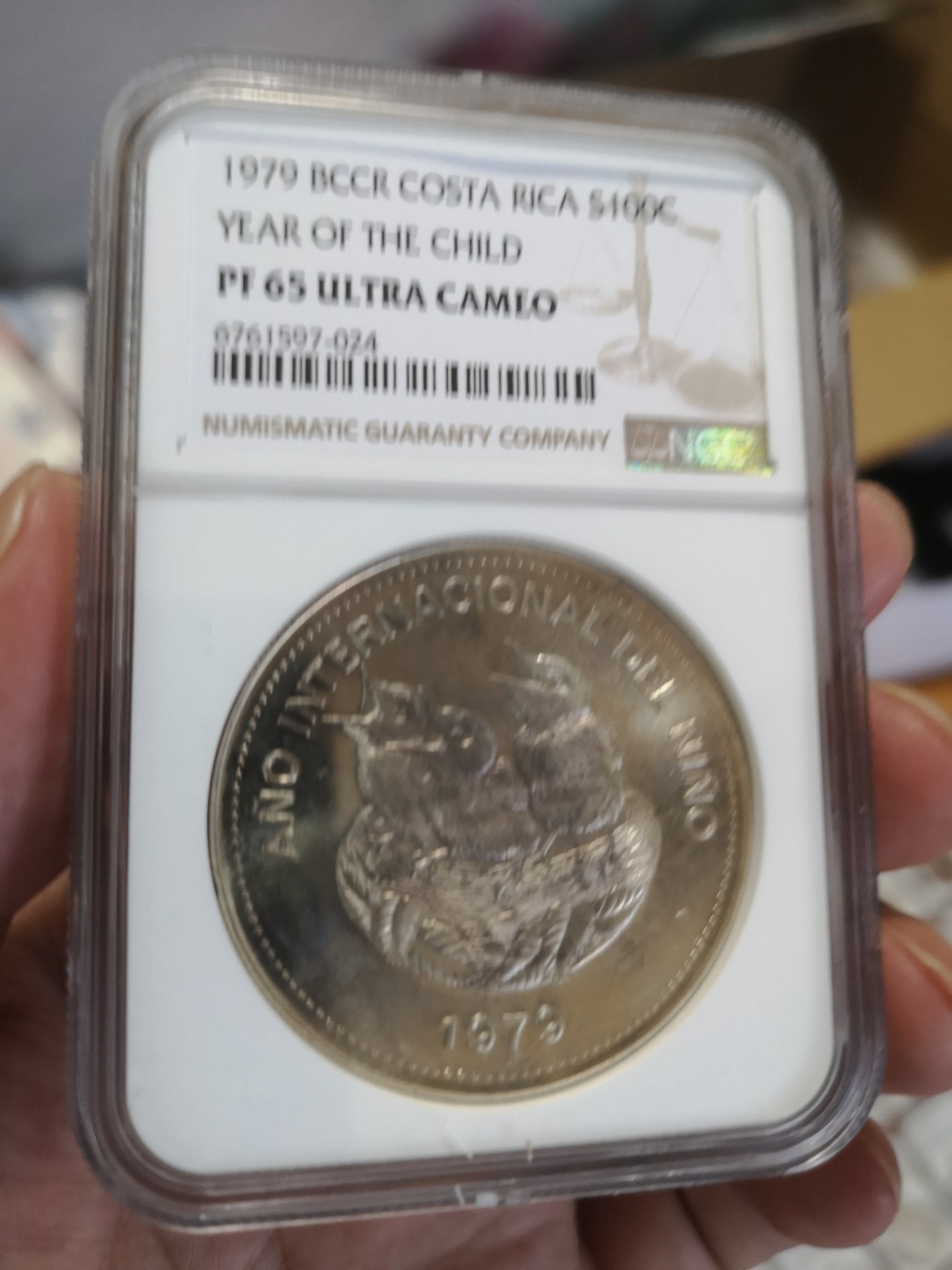 长老汇第17场儿童年评级币 1979哥斯达黎加儿童年100C精制银币，NGC PF65UC