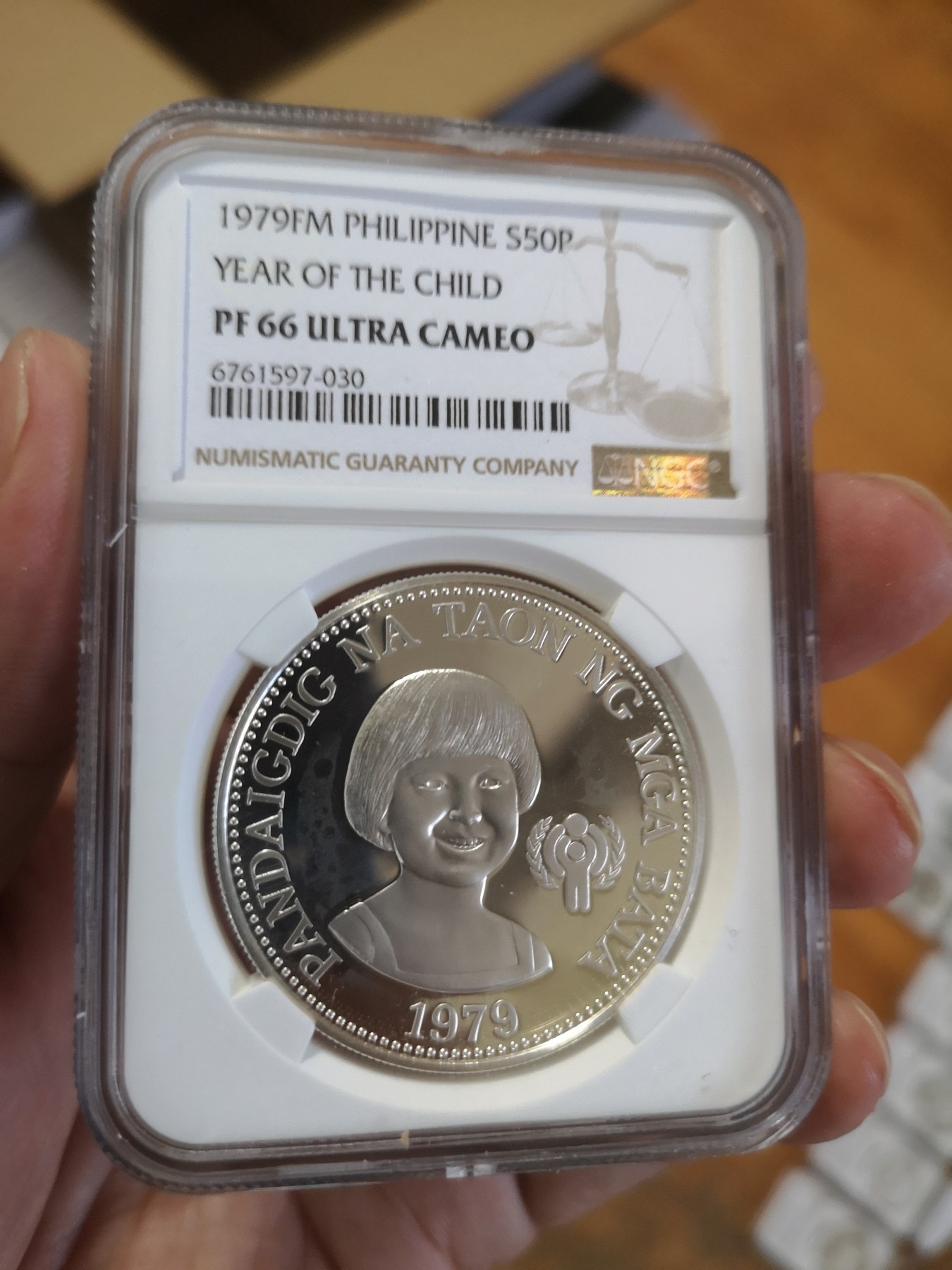 长老汇第17场儿童年评级币 1979菲律宾儿童年50P精制银币，NGC PF66UC