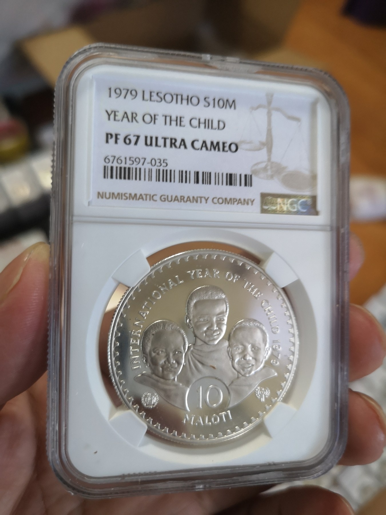 长老汇第17场儿童年评级币 1979莱索托儿童年20M精制银币，NGC PF67UC
