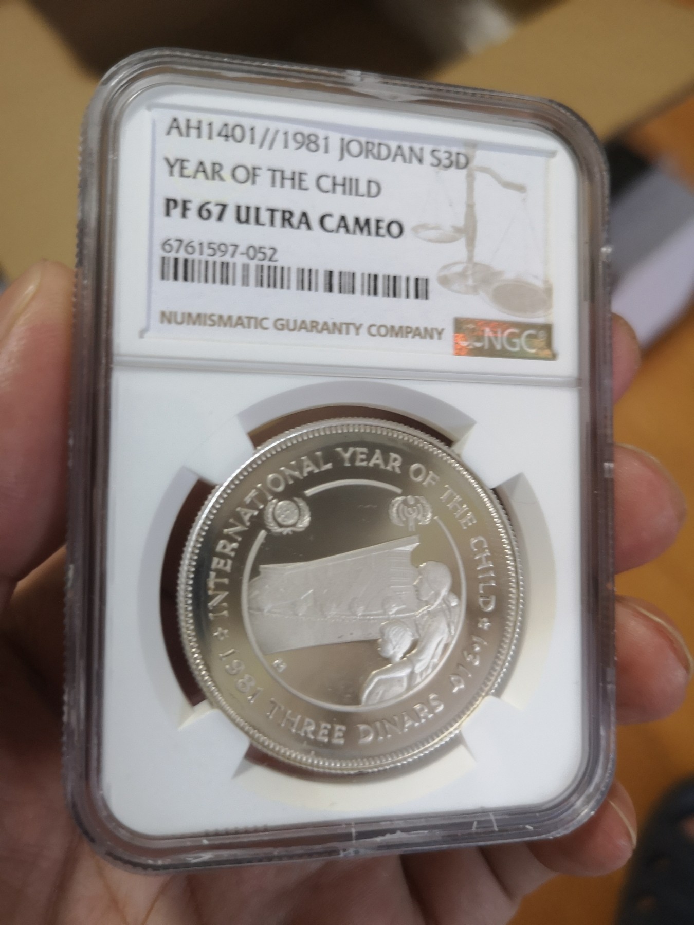 长老汇第17场儿童年评级币 1981约旦儿童年3第纳尔精制银币，NGC PF67UC