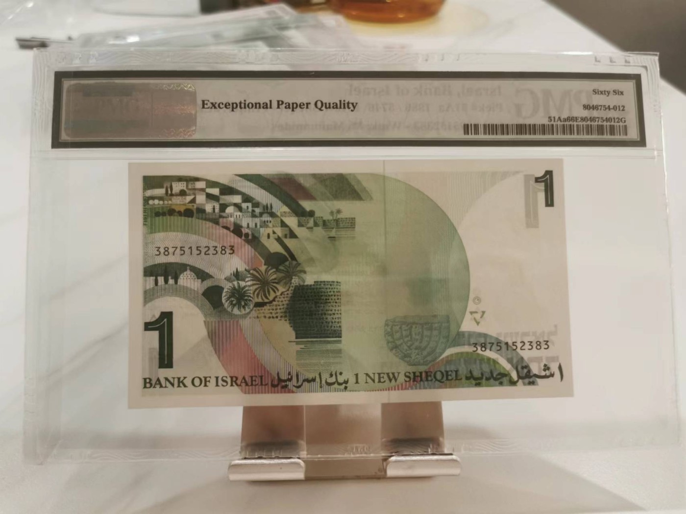 246.【鲸贝乐淘★两拍包邮】三字经·第“百而千，千而万”号拍卖 【以色列🇮🇱】1986年1元，PMG66E