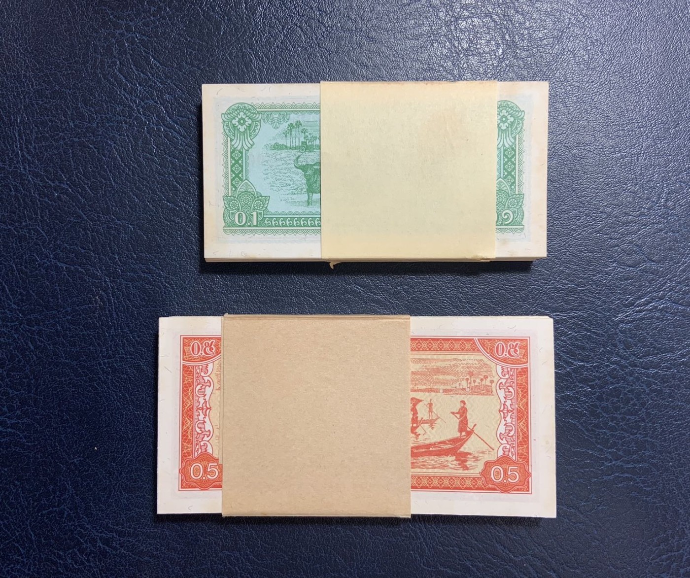 收藏联盟Quantum Auction 第275期拍卖  柬埔寨1979年0.1和0.5瑞尔100连号整刀 品相UNC- 