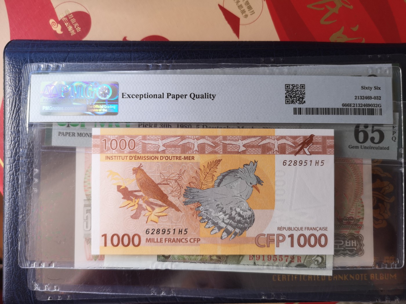 长老汇第18场纸币评级币拍卖 2014法属太平洋地区1000法郎，PMG66，串号：628951H5