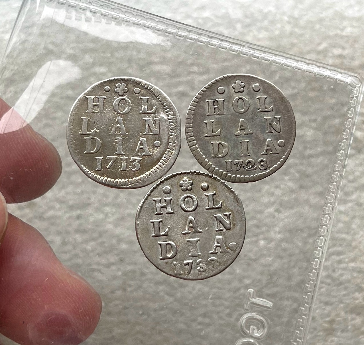 葡属币一批处理、荷兰2S狮子银币、日本/香港/菲律宾评级币，越南胡志明1946年2盾铜币，新疆红钱，朝鲜常平通宝户大当百，日本花钱，北宋铜钱套。彼得堡世界钱币勋章拍卖第62期