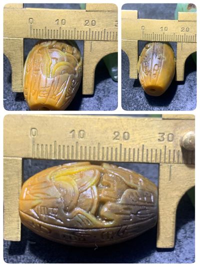 精美亚光战国红玛瑙手工俏色巧雕仿古祥云纹钱币意境勒子一颗！ 精美亚光战国红玛瑙手工俏色巧雕仿古祥云纹钱币意境勒子一颗！