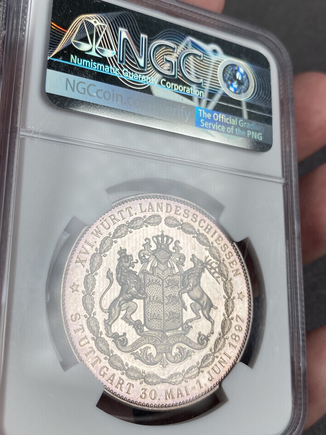 万国钱币拍卖第013期（视频直播专场） NGC MS62 1897年德国符腾堡第十六届射击节纪念银章 极其精美的狮鹿纹章 少见品种 偶出一个也带有吊环 没有吊环的面世的大概就这一个吧