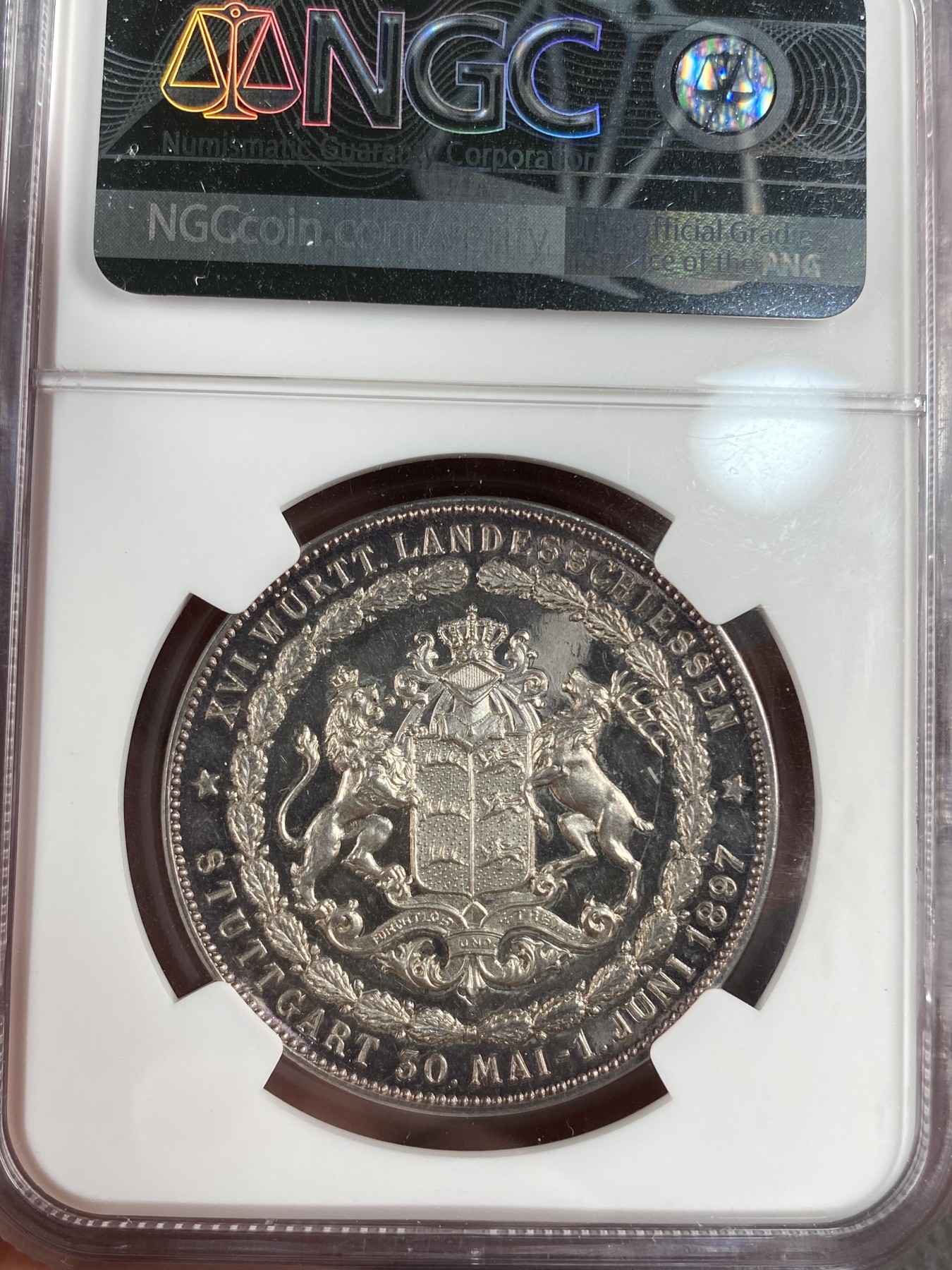 万国钱币拍卖第013期（视频直播专场） NGC MS62 1897年德国符腾堡第十六届射击节纪念银章 极其精美的狮鹿纹章 少见品种 偶出一个也带有吊环 没有吊环的面世的大概就这一个吧