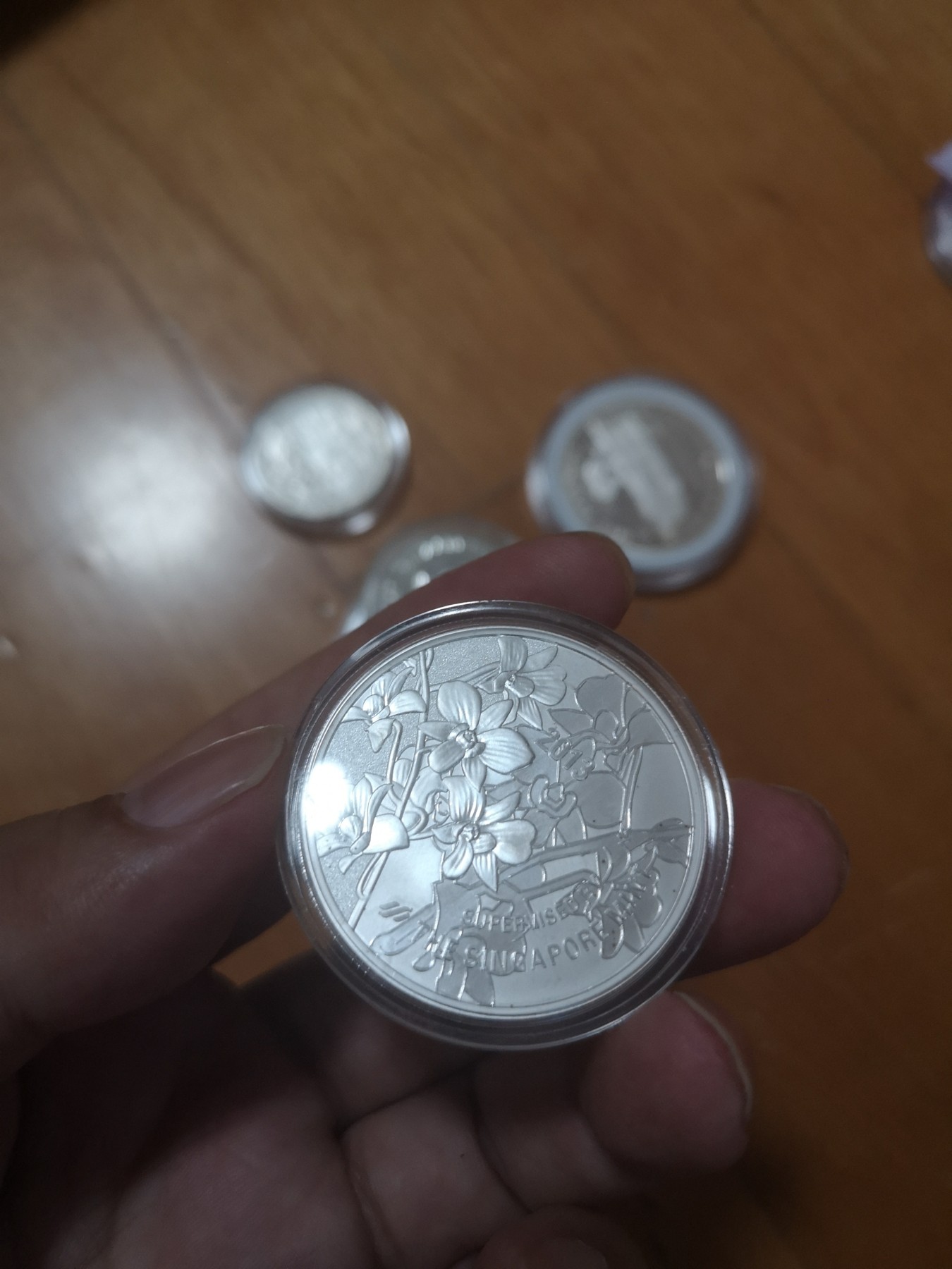 长老汇第24场老银币拍卖 2013新加坡生肖蛇年1盎司999精制彩色银章，新加坡造币厂监制，不多见！