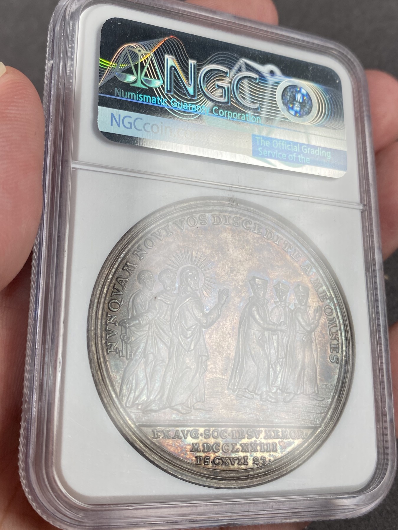 万国钱币拍卖第013期（视频直播专场） NGC MS63 1773年梵蒂冈教皇国大银章，正面为克莱门特教皇十四世，背面是圣彼得，耶稣及耶稣会教士等人物，描述因为背叛废除耶稣会教派的宗教事件，ngc冠军分，早期稀有大银，原味五彩。