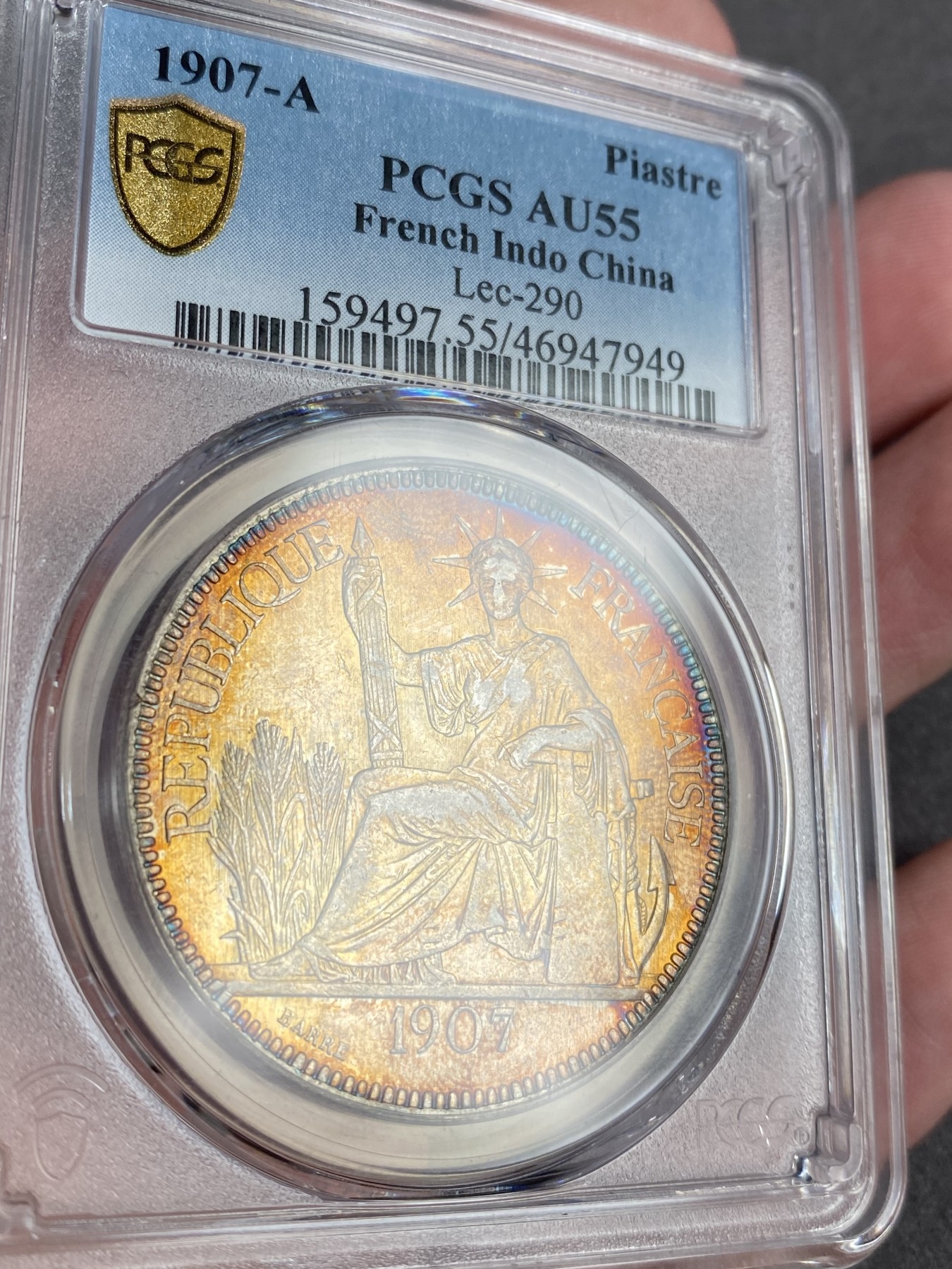 万国钱币拍卖第013期（视频直播专场） PCGS AU55 1907年全金彩法属印支1皮阿斯特大银币