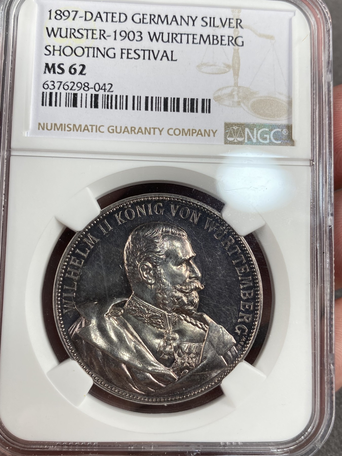 万国钱币拍卖第013期（视频直播专场） NGC MS62 1897年德国符腾堡第十六届射击节纪念银章 极其精美的狮鹿纹章 少见品种 偶出一个也带有吊环 没有吊环的面世的大概就这一个吧