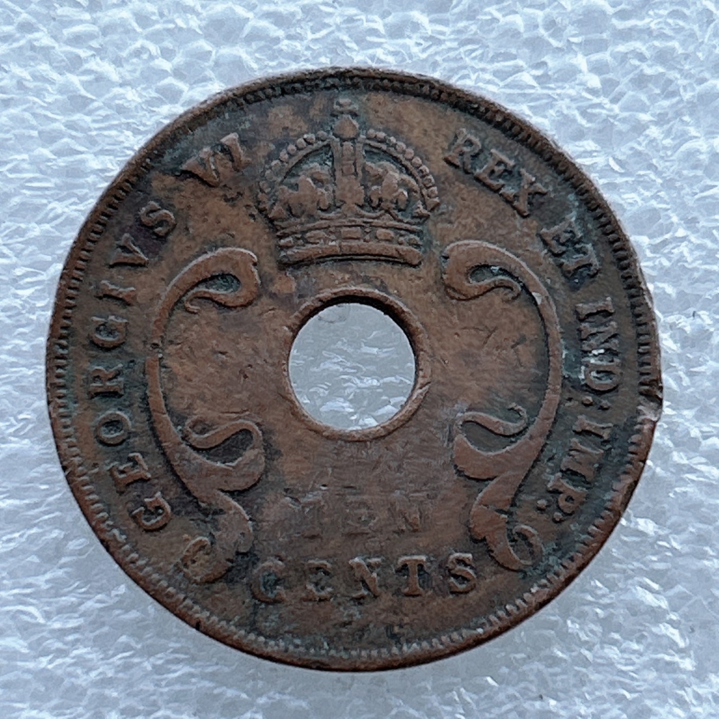 全场一元起拍 世界钱币散币场 第11期 英属东非1942年10分中孔铜币