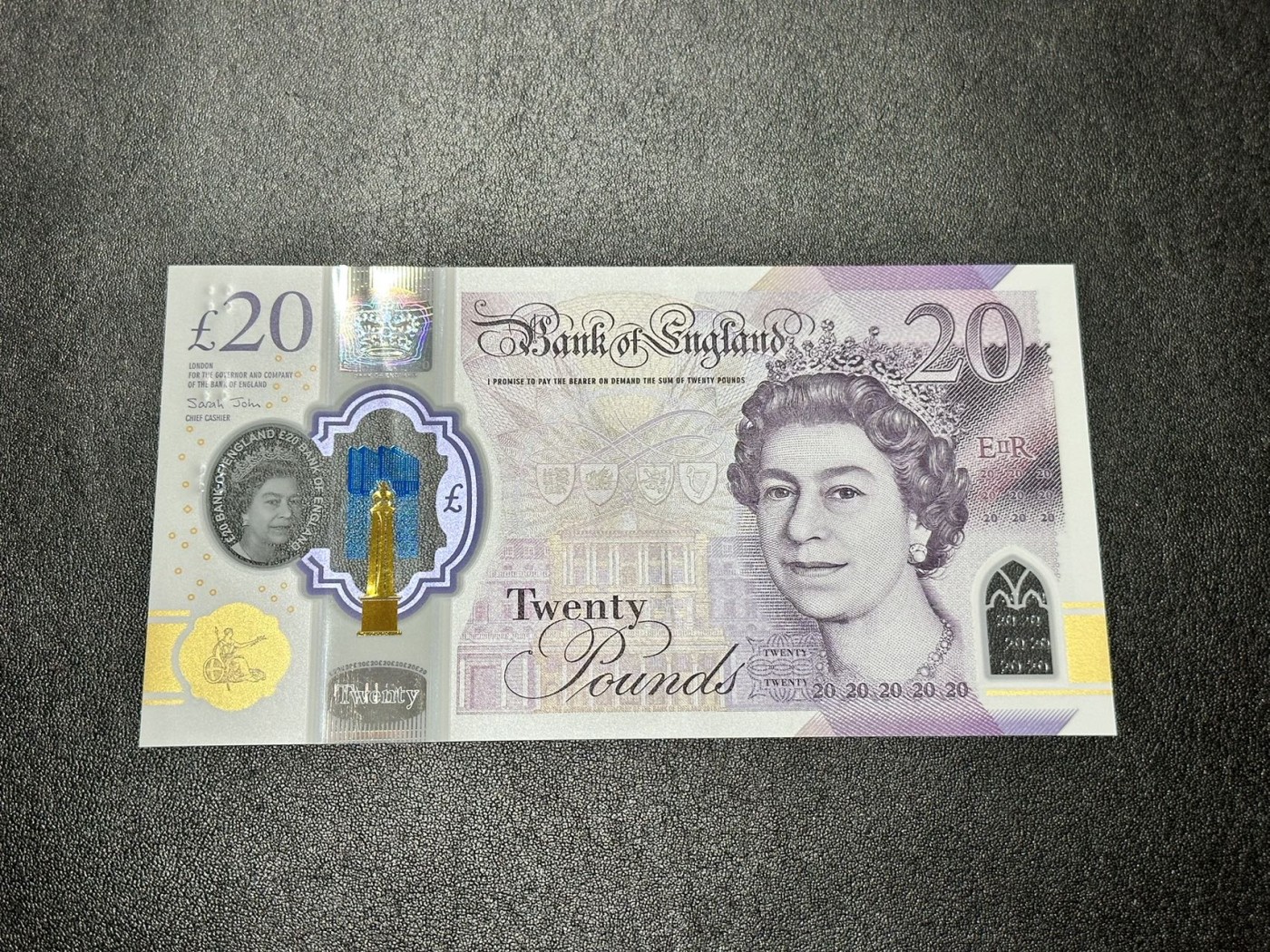 《外钞收藏家》第二百八十八期（连拍第一场） 英国最新版20镑塑料钞 无47 全新 888豹子号 一个压痕