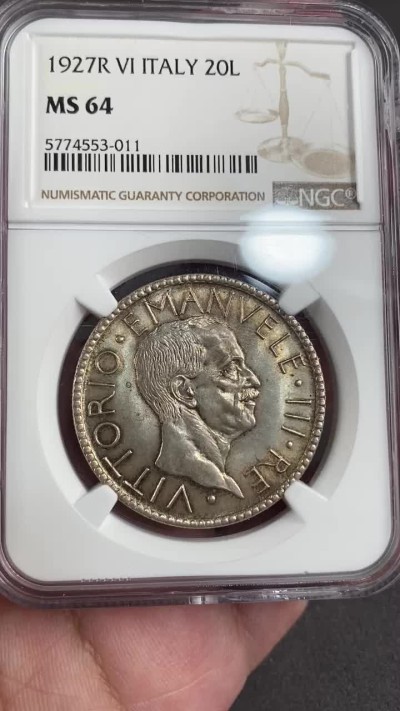 万国钱币拍卖第013期（视频直播专场） NGC MS64 1927年意大利王国维托里奥.埃马努埃莱三世20里拉，转光淡彩。