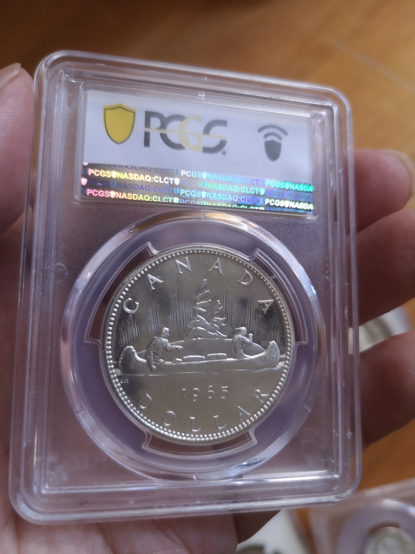 长老汇第25场老银币拍卖 1965加拿大伊丽莎白二世划船1加元类精制银币，PCGS PL66CAM，type1sm beads pt5