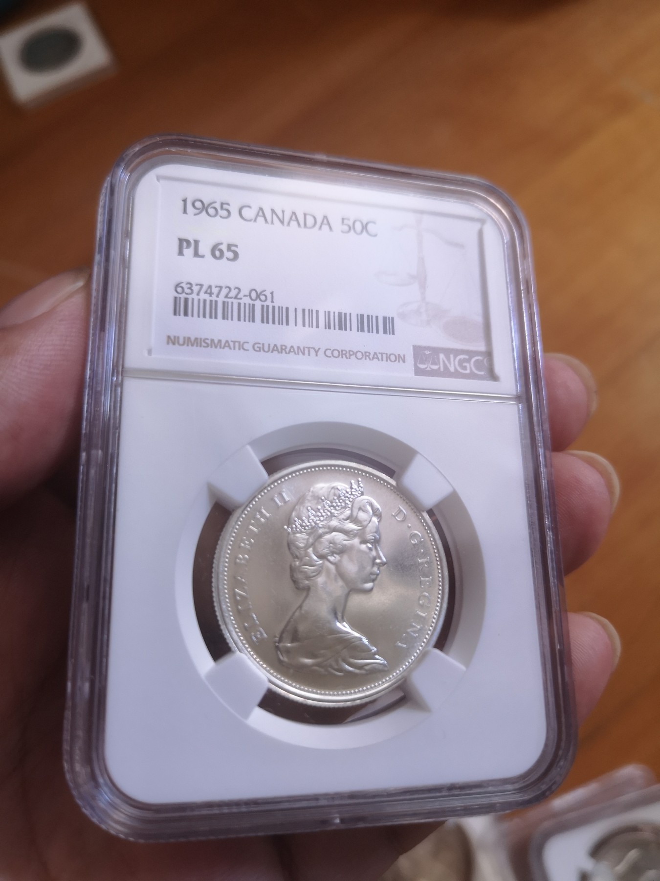 长老汇第25场老银币拍卖 1965加拿大伊丽莎白二世50分类精制银币，NGC PL65