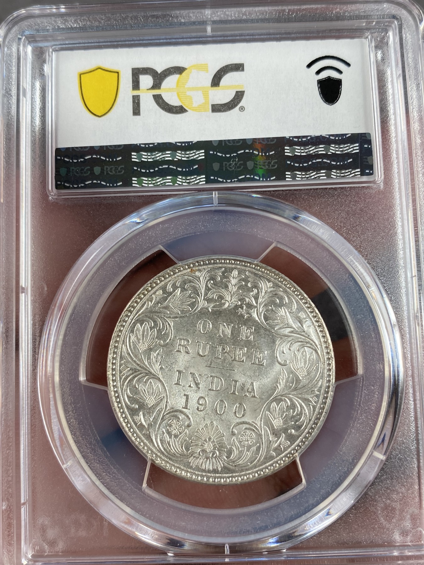 万国钱币拍卖第013期（视频直播专场） PCGS MS62 英属印度小维1卢比银币，暴光状态。