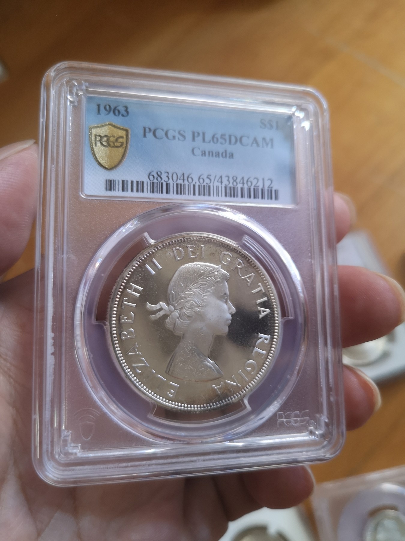 长老汇第25场老银币拍卖 1963加拿大伊丽莎白二世1加元类精制银币，PCGS PL65DCAM