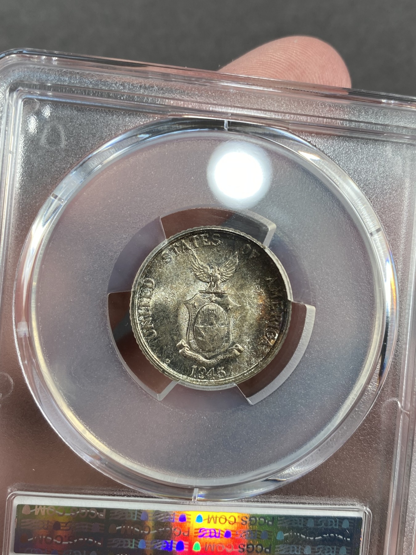 万国钱币拍卖第013期（视频直播专场） PCGS MS66 1945年美占菲律宾行走女神20分银币，顶级品相。