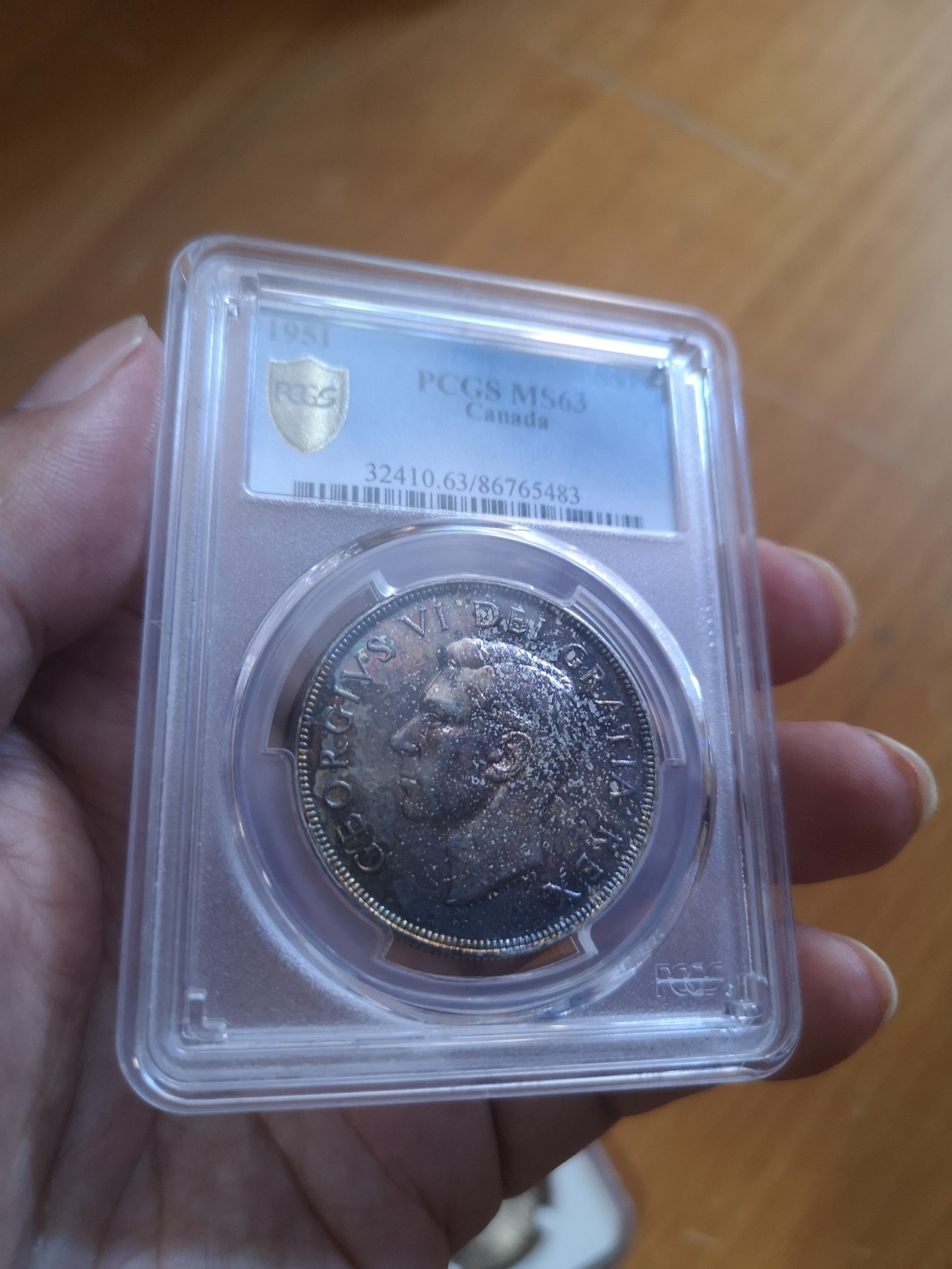 长老汇第25场老银币拍卖 1951加拿大乔治六世划船1加元银币，PCGS MS63，五彩包浆