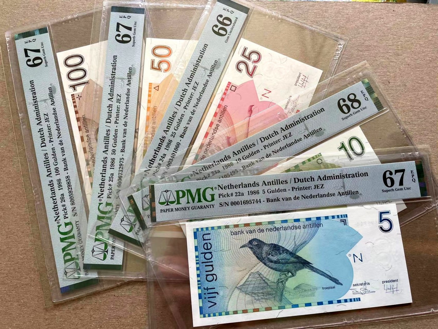 【Blue Auction】✨世界纸币精拍第352期——莫总专场XXVI 【一组5张初版】荷属安的列斯 1986年5-100盾 PMG68EPQ-66EPQ  精美 (其中5盾和10盾为补号 少见 价值大大高于普通号 PMG未标出来）