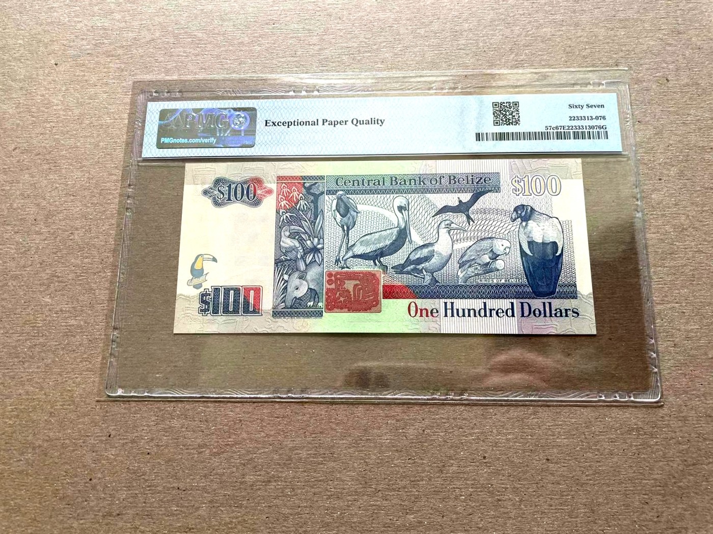 【Blue Auction】✨世界纸币精拍第352期——莫总专场XXVI 【早期年份 p65】伯利兹 1997年100元 PMG65EPQ 女王 背面是当地珍禽